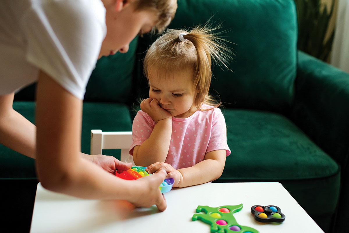 Teen With Toys